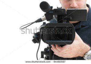 stock-photo-video-camera-operator-working-with-his-professional-equipment-isolated-on-white-background-94460587